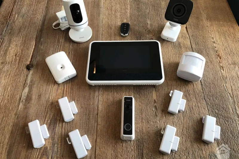 Complete Vivint smart home security system — Smart Hub, doorbell camera, outdoor camera, indoor camera, sensors, and key fob