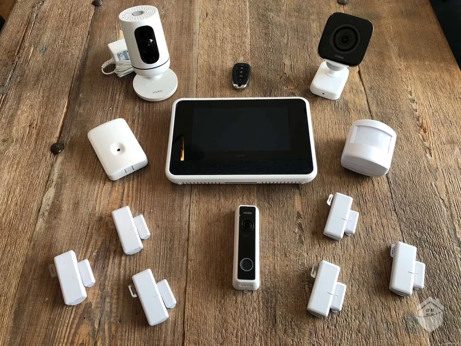 Complete Vivint smart home security system — Smart Hub, doorbell camera, outdoor camera, indoor camera, sensors, and key fob
