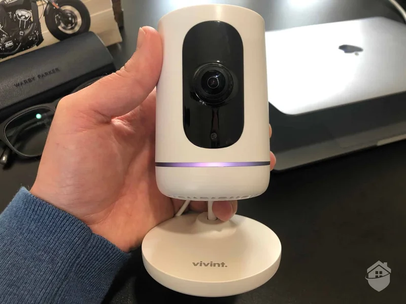 Vivint indoor camera in hand
